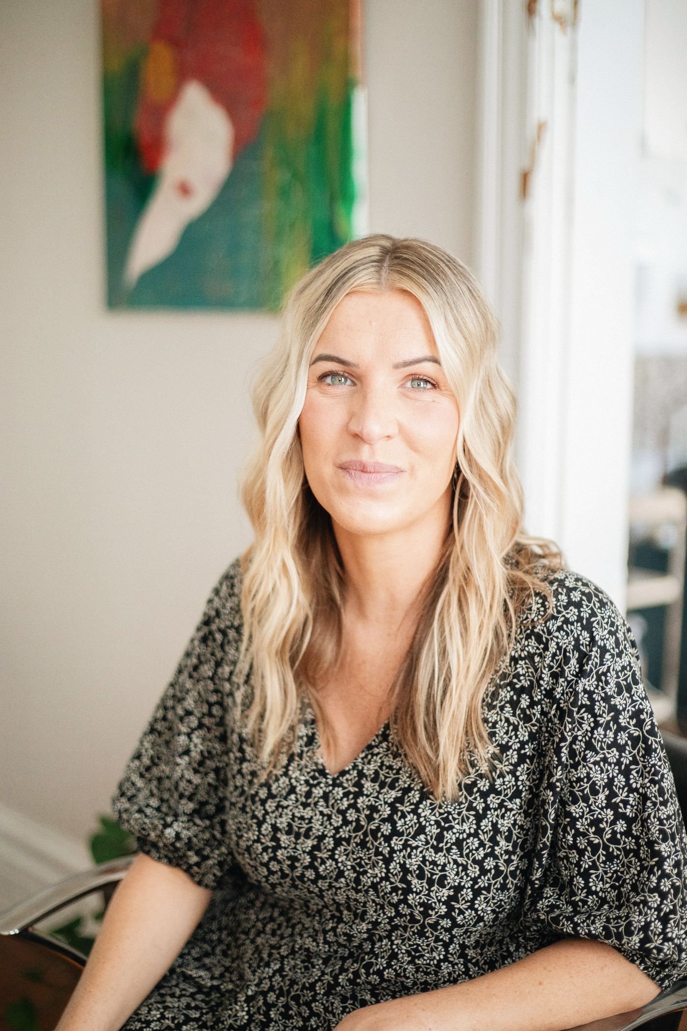 Editorial portrait of a stylist in a contemporary salon